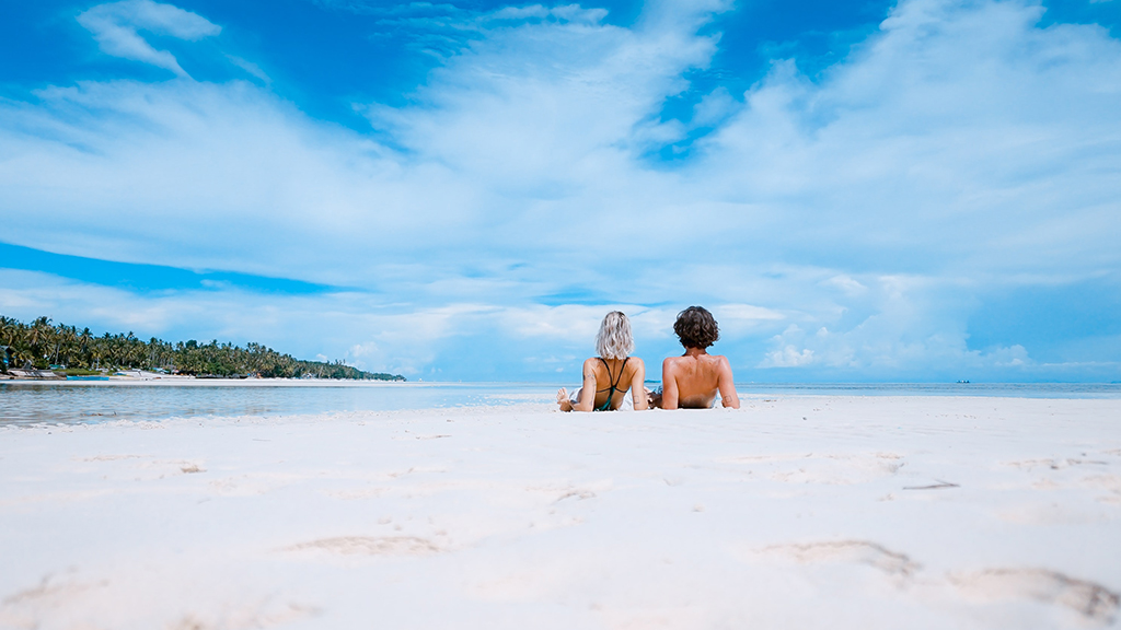 Couple Relaxing at the Beach - unsplash